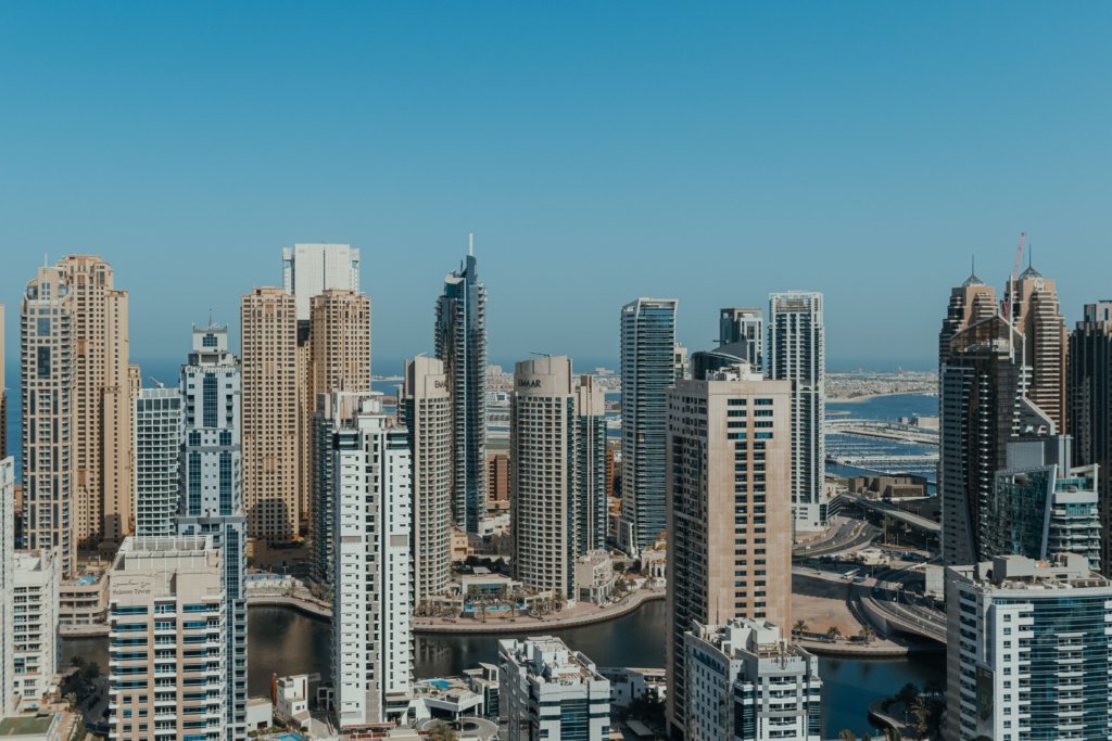 Aerial view of Dubai Marina skyscrapers and waterfront skyline representing the 2026 Dubai property market