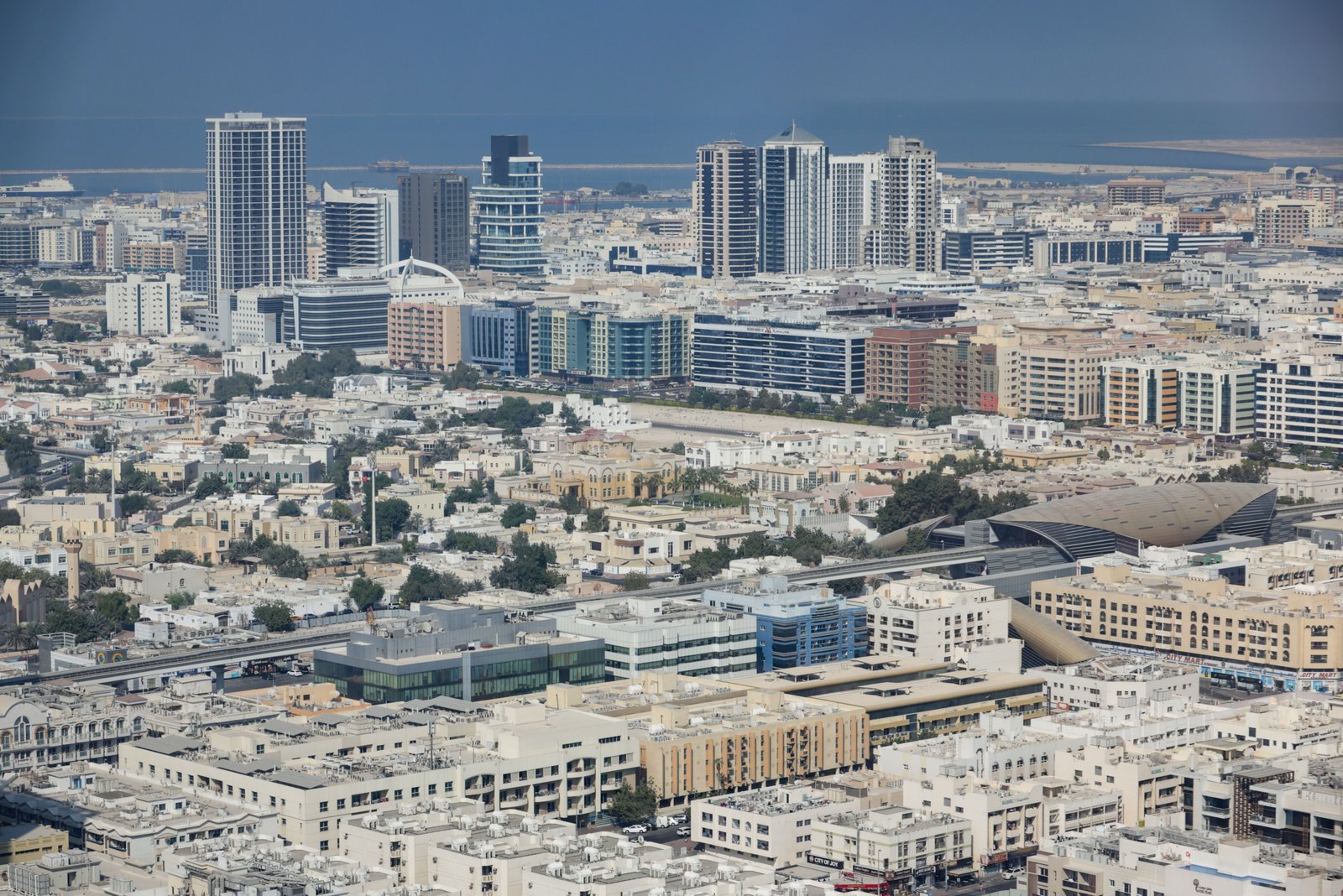 Aerial view of Dubai modern skyline showing residential and commercial towers