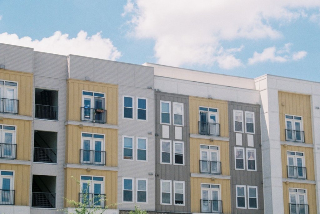 Multi-story apartment building in Dubai representing shared housing rental units
